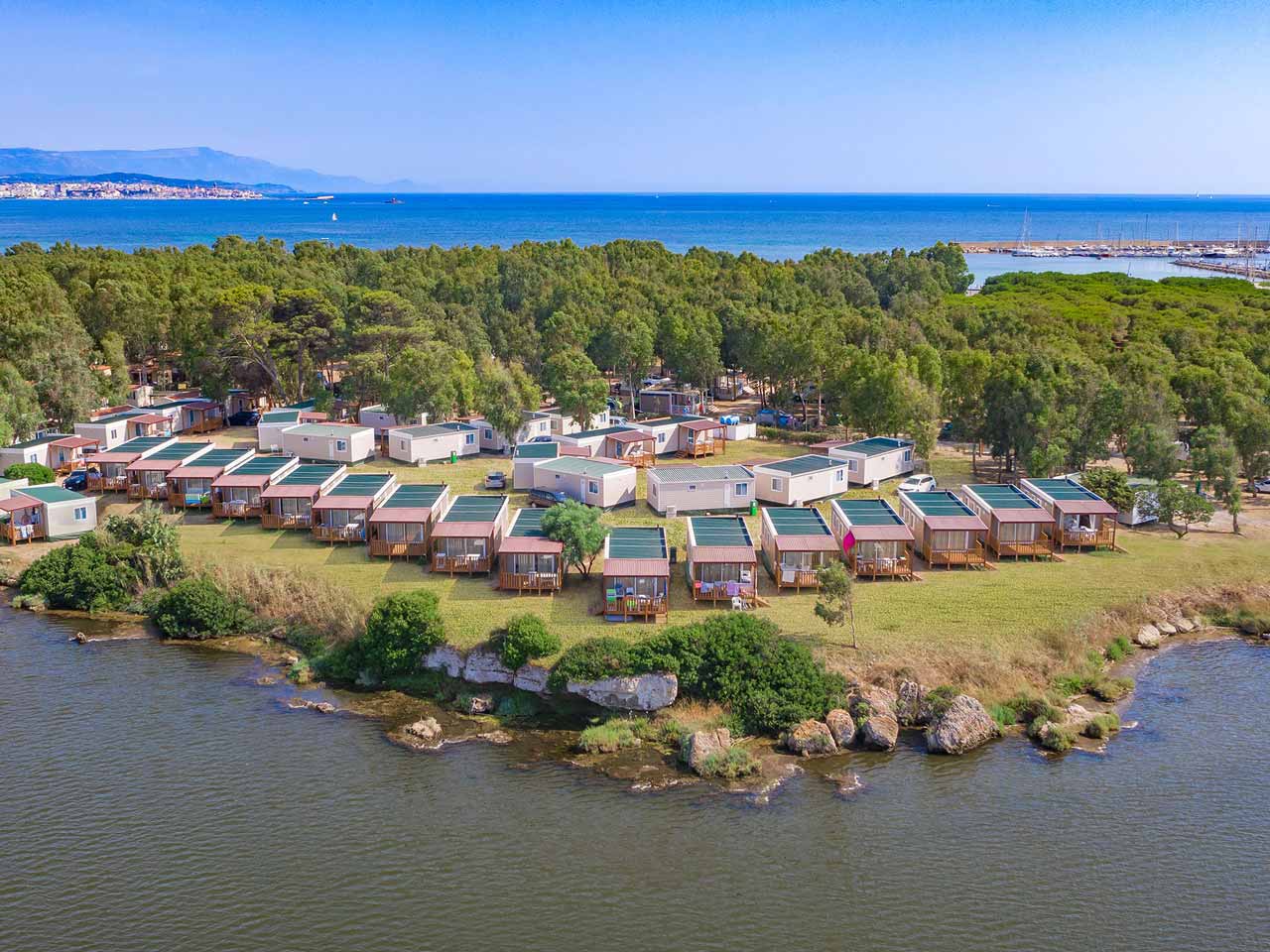 Concorso PLEINAIR ENTRA & VINCI, in palio un buono Baia Holiday: Camping Village Laguna Blu